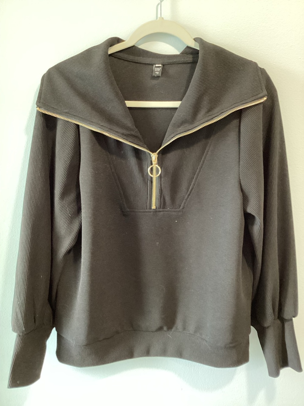 Women's Black Ribbed Half-Zip Sweatshirt with Gold Ring Pull